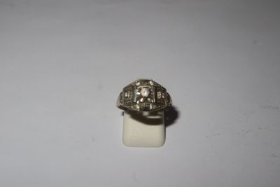a ring that is sitting on top of a white surface