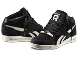 black and white high top sneakers on a white background