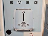 a box with a toaster sitting on top of it