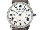 a close up of a wrist watch with roman numerals and diamonds