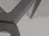 a close up of a metal table with a hole in it