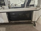 an image of a microwave sitting on top of a cart