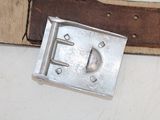 a belt that has a buckle on it that is attached to a belt