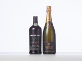 two bottles of wine sitting next to each other on a table