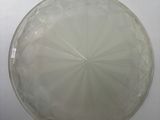 a glass plate with a circular design on it