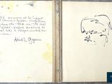 an open book with a drawing of a man ' s face on it