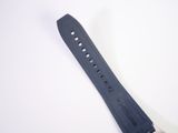 a close up of a watch strap on a white surface