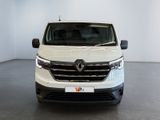 the front view of a white van parked in a white room