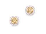 une paire de boucles d'oreilles en diamants jaunes et blancs