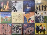 a lot of posters on the wall of a room