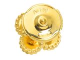 a close up of a gold button on a white background