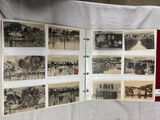 an old photo of a bunch of old photos on a table