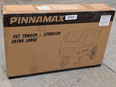 packaging for a new pet trailer and stroller on the sidewalk