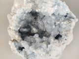 a close up of a piece of crystal on a table