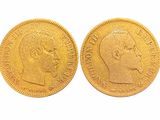 une pièce d'or représentant le profil d'un homme et la tête d'une femme