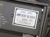 a metal box with a sign on it that says signal corps amplifier booth