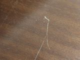 a close up of a table with a brown table top