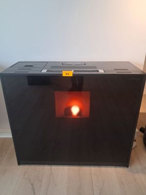 a black box with a red light inside of it