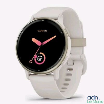 a close up of a smart watch on a white surface