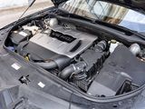 the engine of a car with its hood open and the hood open