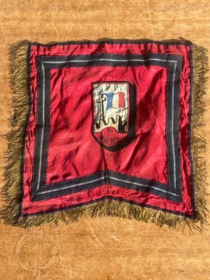an image of a red and black flag with a coat of arms on it