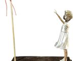 a statue of a little girl holding a heart shaped balloon