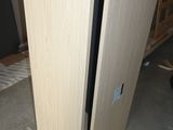 a picture of a small refrigerator in a room