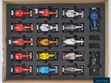 a box with a lot of toy cars in it