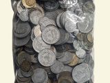 a bag full of coins sitting on a table