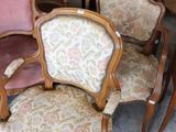 many chairs that are lined up in a room