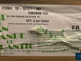 a box of pokemon tcg items on the table