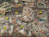 many different types of stamps on the table together