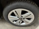 a close up of a tire on a car ' s rim