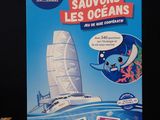 a picture of a card game with a picture of a catamaran
