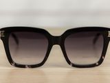 a close up of a pair of sunglasses on a table