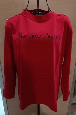 a picture of a red shirt with the words you first learn written on it