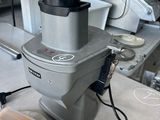 a machine that is sitting on a counter in a kitchen