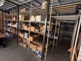 a room with a lot of boxes and shelves