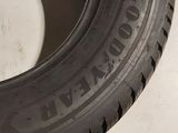 a close up of a tire on a white surface