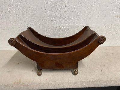 vintage wooden magazine holder with three sections of wood in the shape of a wave