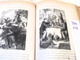 an open book with pictures of people and animals on it