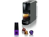 a coffee machine with a cup of coffee next to it