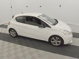 a picture of a white car parked in a garage