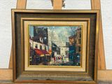 a picture of a painting on an easel with a picture on it