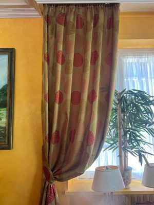 a painting on the wall above a bed in a bedroom