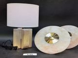 a lamp that is sitting on a table next to a lamp