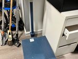 an image of a weight scale in a room