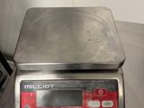 an image of a kitchen scale on a table