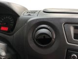 a close up of a car dashboard with a steering control