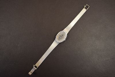 1 montre bracelet dame or gris -r- entourage 24 diamants 32g…